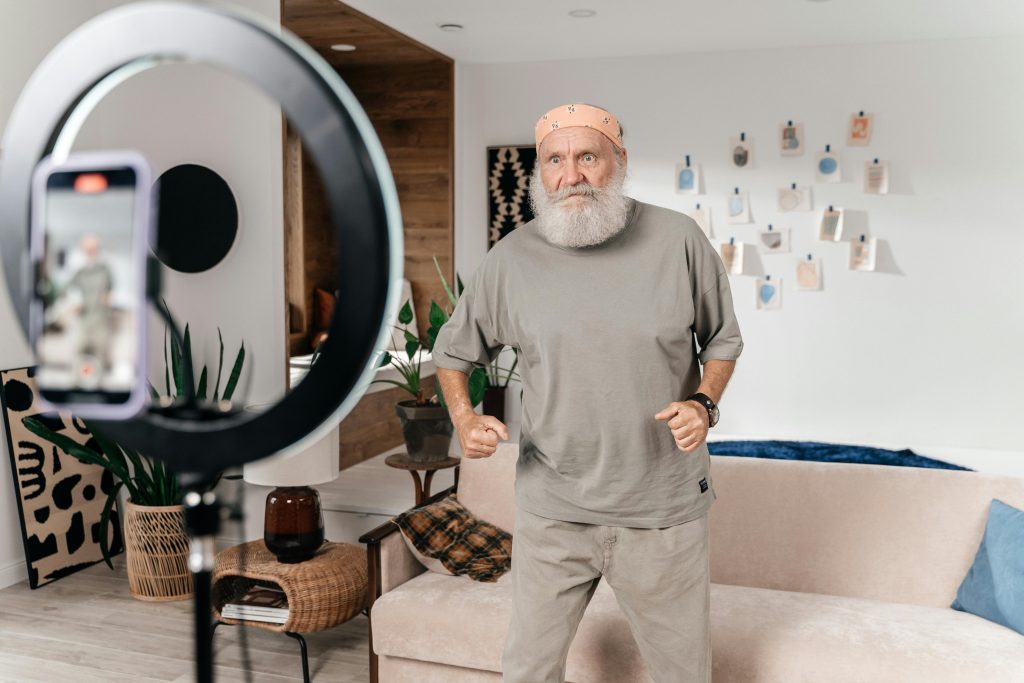 Man Recording himself in his Living Room